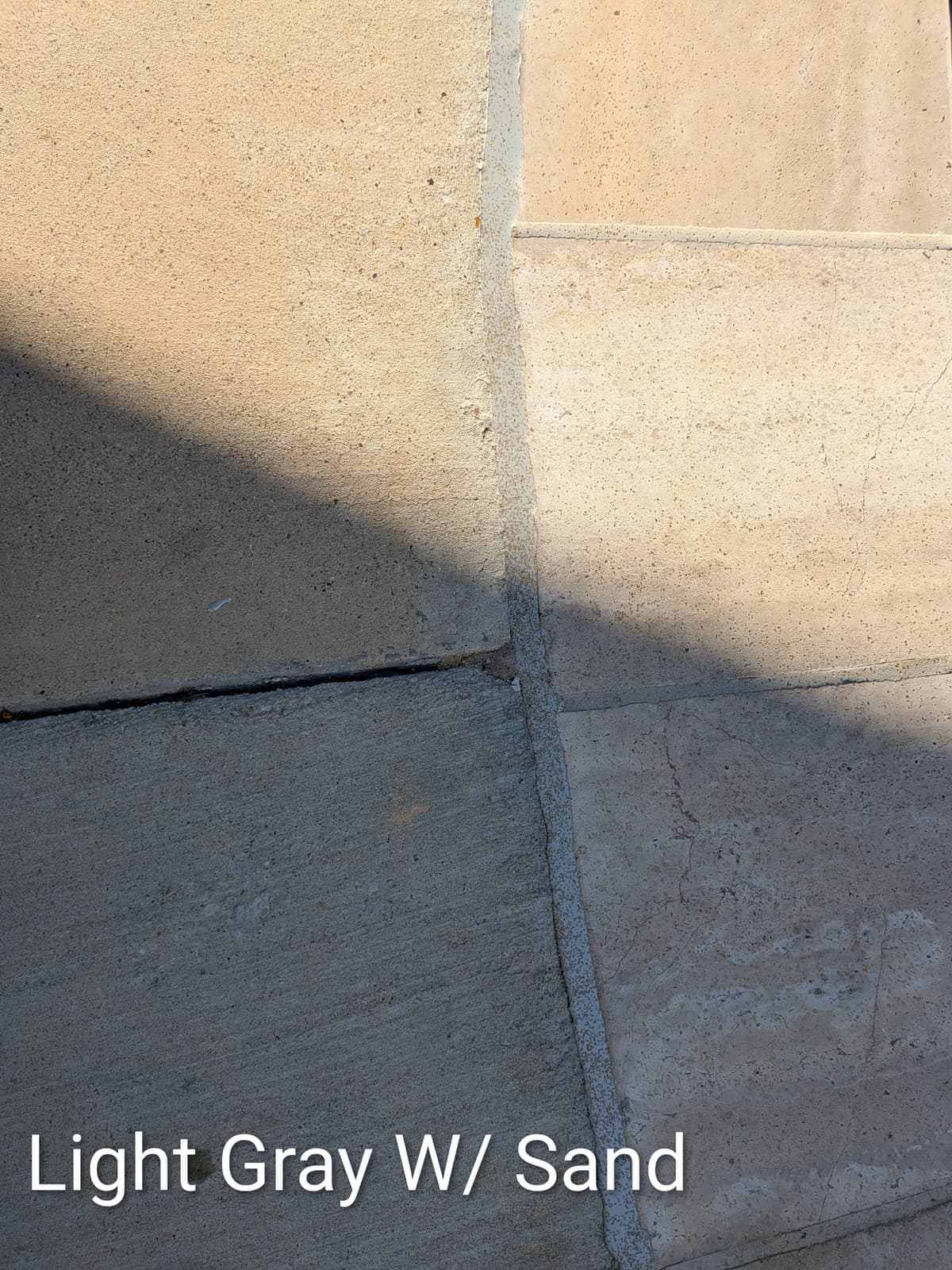 Light Gray with Sand pool mastic sealant color example, a Dallas Mastic custom blend of Sika Gray — textured sand finish