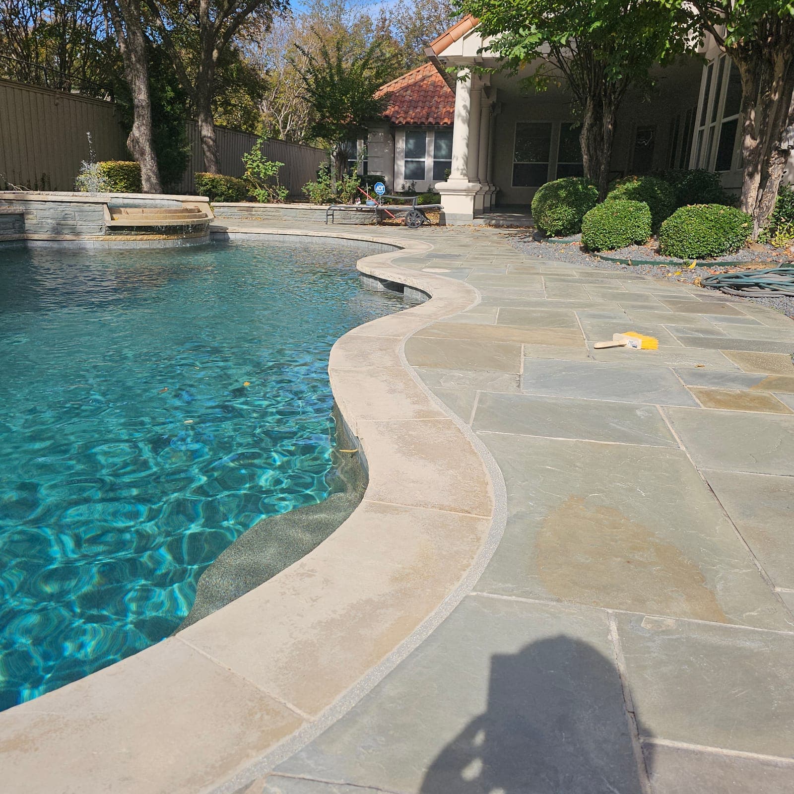 Freshly installed pool mastic expansion joint with clean finished lines in Dallas, Texas