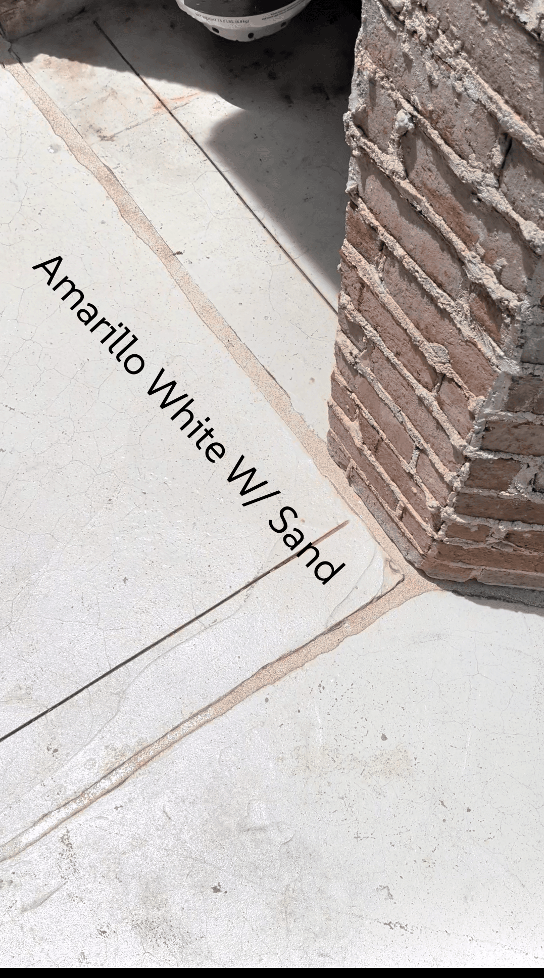 Sika Amarillo White with Sand pool mastic sealant color example — textured sand finish