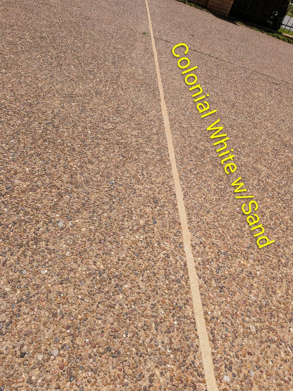 Sika Colonial White with Sand pool mastic sealant color example — textured sand finish