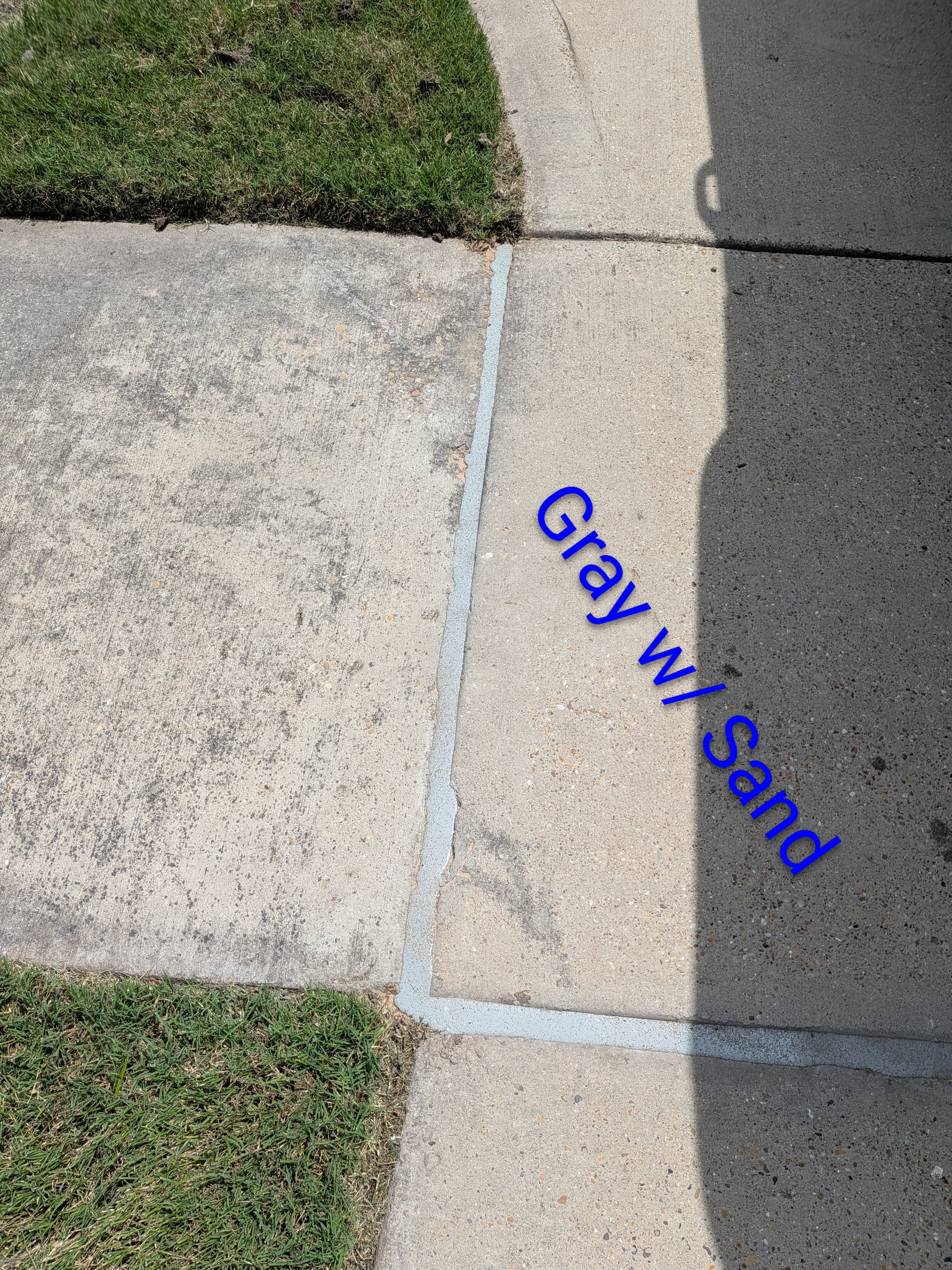 Sika Gray with Sand pool mastic sealant color example — textured sand finish