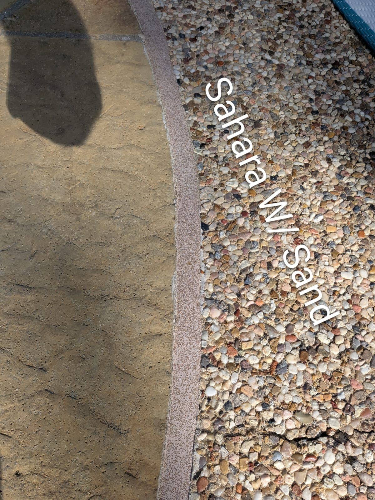 Sika Sahara with Sand pool mastic sealant color example on exposed aggregate pool deck — textured sand finish